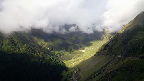mountain landscape photography of green mountains valley