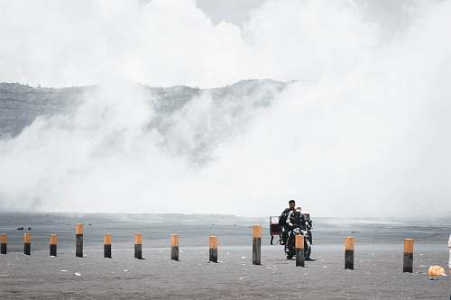 human man riding motorcycle person