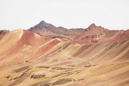 soil mountain at daytime sand