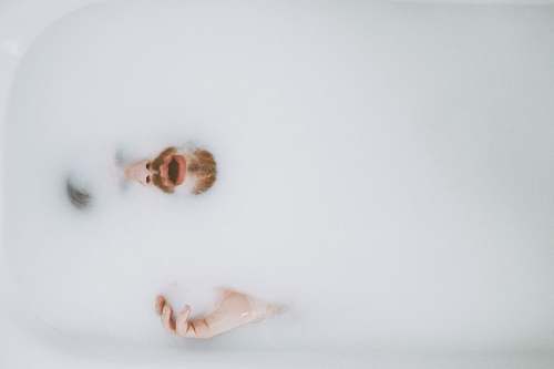 outdoors person on bath tub showing beard animal