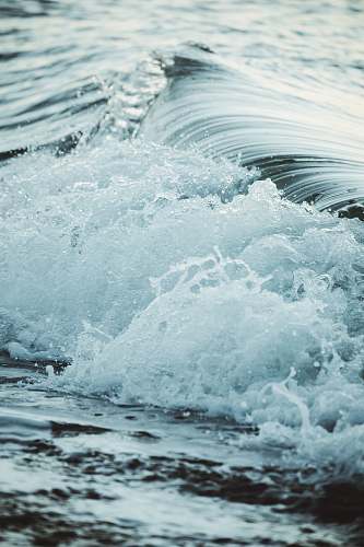 sea close up photography sea waves splashing on shore water