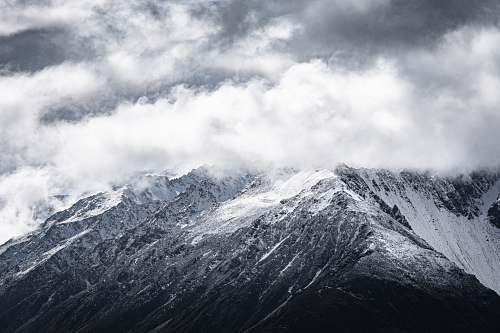 mountain aerial photography of gray and black mountain mountain range