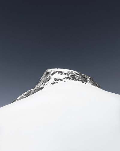 mountain rocky mountain covered by snow nature