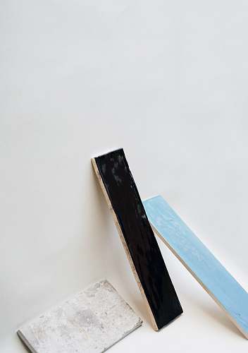 minimal two teal and black wood planks tile