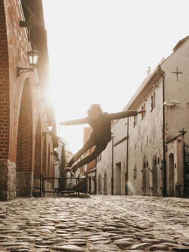 walkway man doing skateboard trick flare