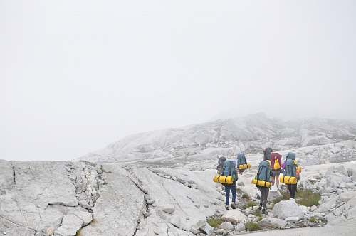 human group of people hiking on moutain person