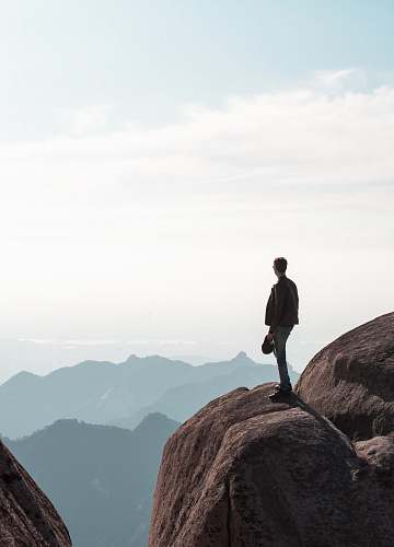 person man on cliff human