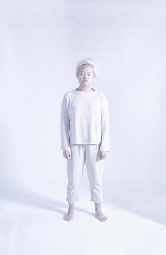 human person wearing white long-sleeved shirt person
