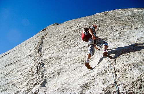 human man climbing on mountain climbing
