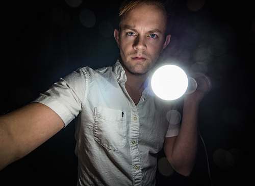 human man holding bulb people