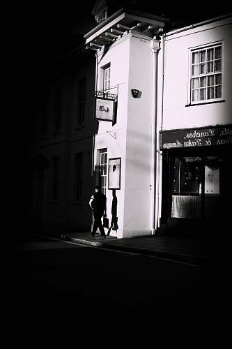 human man walking beside road truro