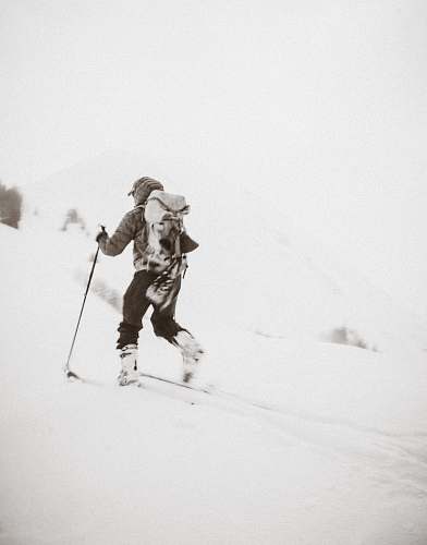 skiing person hiking in snow mountain snow
