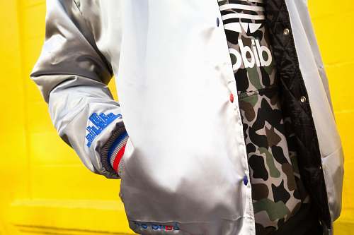 people person in white jacket with hands in pocket human