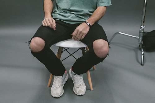 people person sitting on white wooden stool human