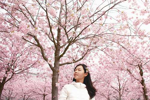 blossom woman facing sideways flora