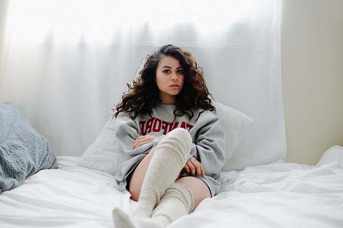 human woman lying on bed people