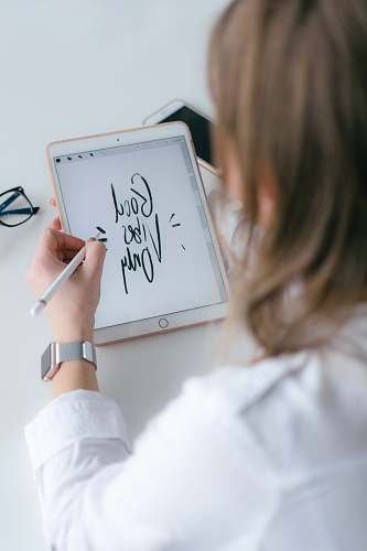 human woman using iPad text