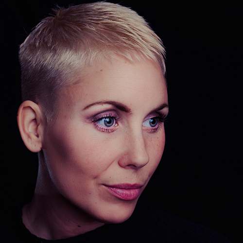 people woman wearing crew-neck tee shirt with blonde short hair and pink lipstick human