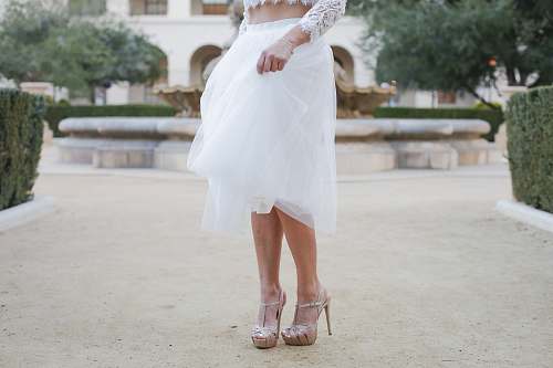 human woman wearing white skirt people