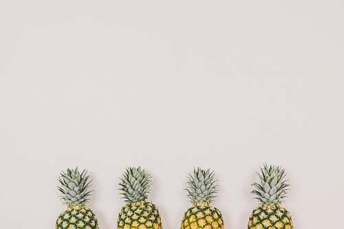 food four pineapples on white background fruit