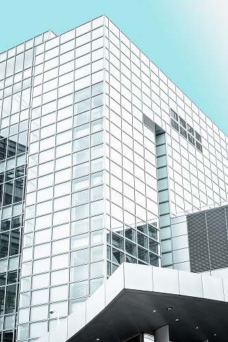 architecture white and clear glass high-rise building building