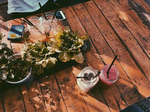 flora mason jars on wooden table jar