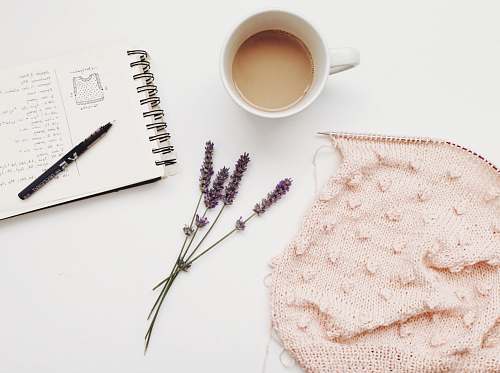 lavender white ceramic mug with coffee coffee