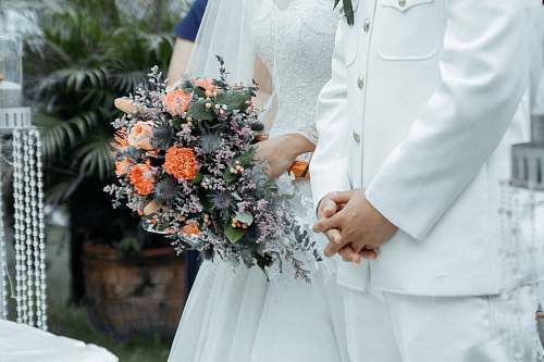 flora woman holding bridal bouquet jar