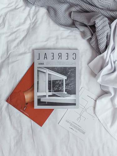 reading Cereal book on white textile white