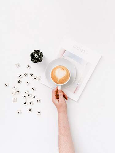 food person holding coffee cup egg