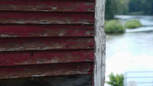 river brown and red wooden house board shack