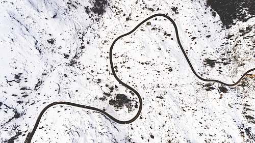 snake snow capped mountain during daytime animal