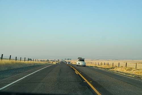 freeway white car on concrete road highway