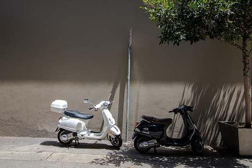 moped black and white motor scooter transportation