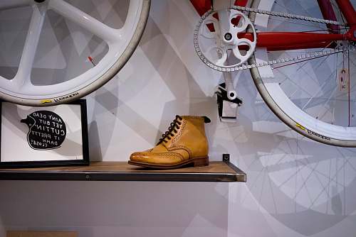 footwear unpaired brown leather wingtip shoe on floating shelf clothing