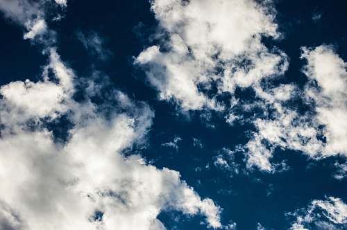 cloud low angle photography of blue sky clouds