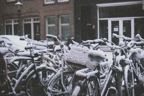 weather bike parked on street covered with snow winter
