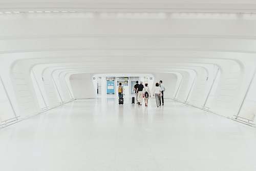 corridor people on hallway bilbao airport