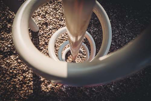 playground photo of white spiral equipment spiral cord