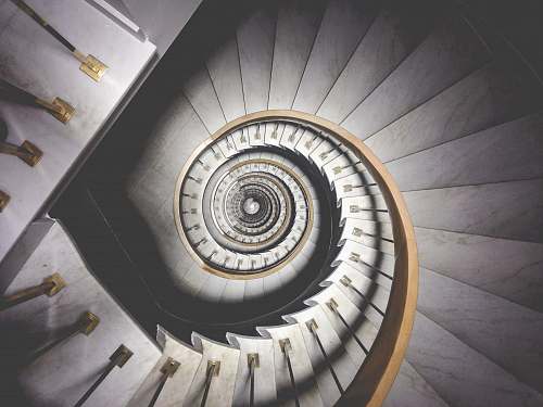 spiral photo of spiral white stairs architecture