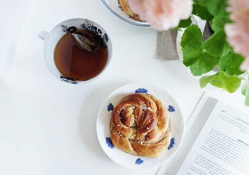 food baked bread serving on white and blue plate pastry
