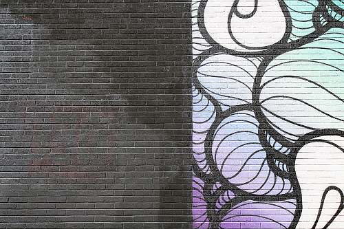 brick black, white, and purple abstract artwork wall