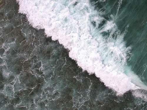 ocean aerial shot of water waves sea