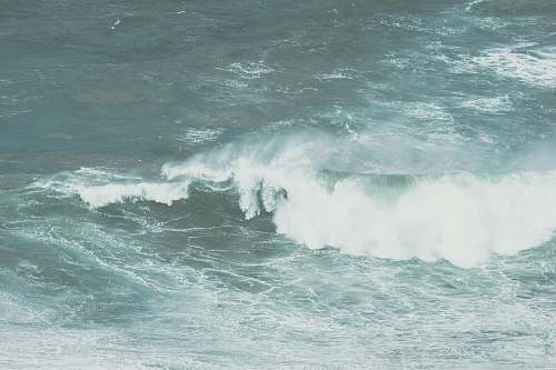 grey gray ocean wave during daytime ocean