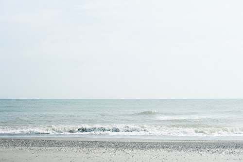 nature ocean waves crashing to store sea