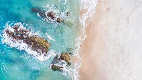 portugal rocky shore during daytime ocean