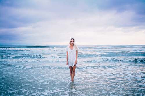 ocean woman standing at sea people
