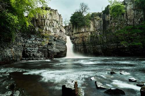rock landscape photo of waterfalls river