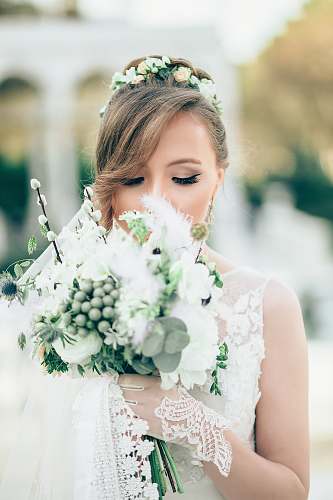 human bride smelling the flowers people