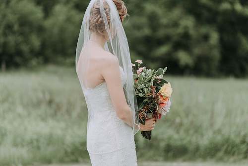 human woman holding bouquet of flower person